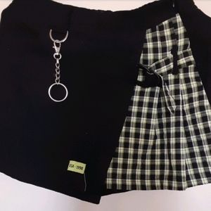Bershka pleated skirt with plaid insert in black